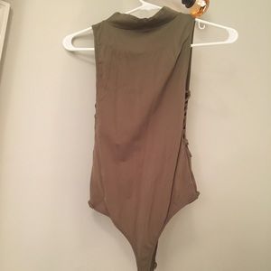 Free people highneck bodysuit. M/L